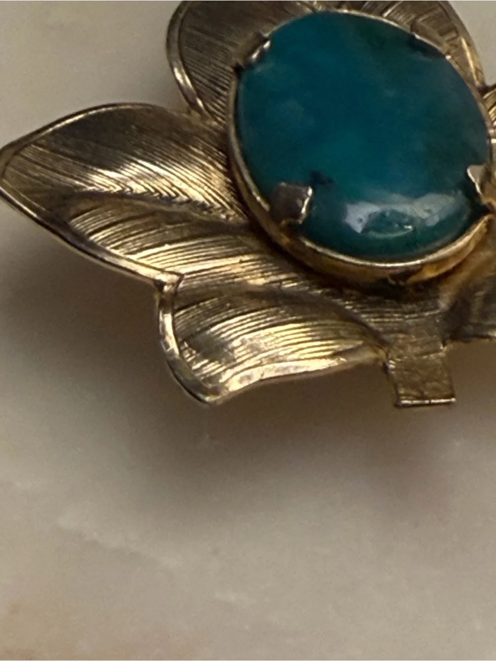 Silver tone leaf brooch with‎ blue cabochon stone pin